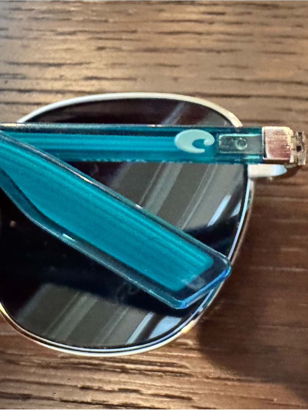Costa Teal Frame Polarized women’s Sunglasses
